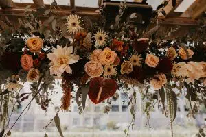 Mondern Hanging Ceremony Flowers by Rainy Sunday at Camperdonw Commons